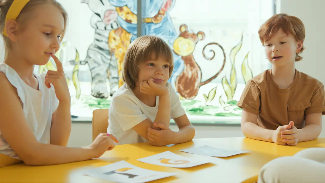 Kids Thinking At Desk